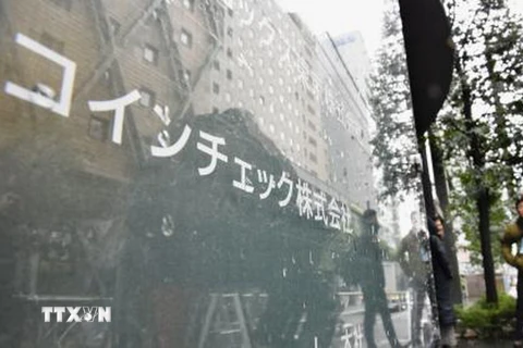  Tên của sàn giao dịch Coincheck được gắn trên tòa nhà thuộc sở hữu của công ty ở Tokyo ngày 2/2. (Nguồn: Kyodo/TTXVN)