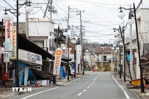Cảnh vắng vẻ tại một con phố ở thị trấn Futaba, tỉnh Fukushima do người dân đi sơ tán sau thảm họa động đất và sóng thần năm 2011. (Nguồn: Kyodo/TTXVN)