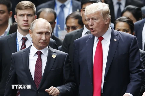 Tổng thống Nga Putin (phải) và Tổng thống Mỹ Donald Trump. (Nguồn: AFP/TTXVN)