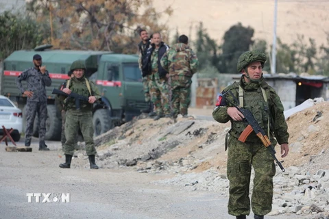  Quân cảnh Nga tại trạm kiểm soát ở Wafideen, ngoại ô Damascus (Syria) ngày 9/3. (Nguồn: AFP/TTXVN)