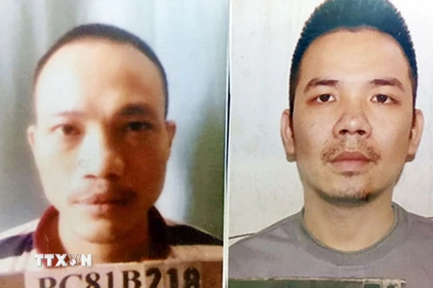 Tử tù Nguyễn Văn Tình (bên phải) và tử tù Lê Văn Thọ. (Nguồn: TTXVN)
