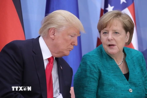 Tổng thống Mỹ Donald Trump (trái) và Thủ tướng Đức Angela Merkel. (Nguồn: AFP/TTXVN) 