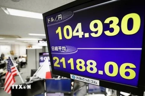 Bảng tỷ giá chứng khoán tại thủ đô Tokyo, Nhật Bản. (Nguồn: Kyodo/TTXVN)