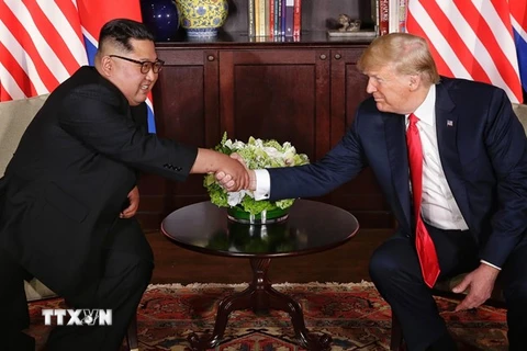 Tổng thống Mỹ Donald Trump và nhà lãnh đạo Triều Tiên Kim Jong-un. (Nguồn: THX/TTXVN)