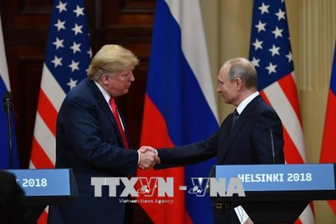 Tổng thống Mỹ Donald Trump (trái) và Tổng thống Nga Vladimir Putin trong cuộc họp báo chung kết thúc Hội nghị thượng đỉnh ở Helsinki, Phần Lan ngày 16/7. (Nguồn: AFP/ TTXVN) 