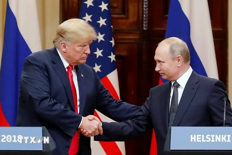 Tổng thống Mỹ Donald Trump (trái) và người đồng cấp Nga Vladimir Putin trong cuộc họp báo sau cuộc gặp thượng đỉnh ở Helsinki, Phần Lan ngày 16/7. (Nguồn: EFE-EPA/TTXVN)