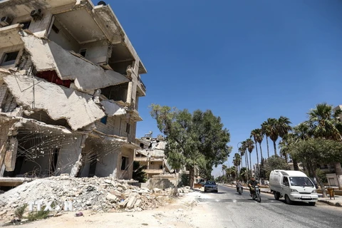 Cảnh đổ nát sau các cuộc xung đột ở thành phố Idlib, Syria ngày 25/8. (Ảnh: AFP/TTXVN)