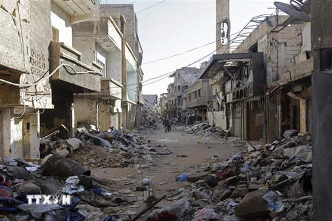 Cảnh đổ nát sau các cuộc xung đột ở Damascus, Syria ngày 3/11. (Ảnh: AFP/TTXVN)