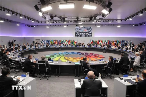 Các nhà lãnh đạo G20 thảo luận tại hội nghị ở Buenos Aires, Argentina ngày 30/11/2018. (Ảnh: AFP/TTXVN)