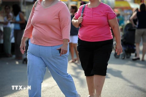 Phụ nữ bị mắc bệnh béo phì tại Gaithersburg, bang Maryland, Mỹ. (Ảnh: AFP/TTXVN)