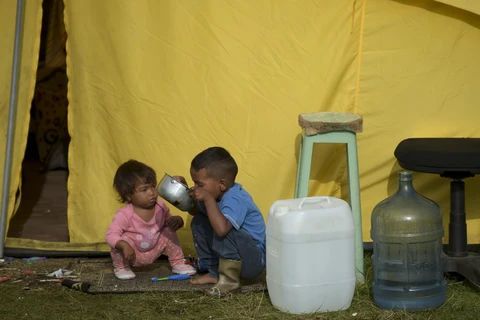 Trẻ em tị nạn Venezuela tại lều tạm ở Bogota, Colombia, ngày 9/1/2019. (Ảnh: AFP/TTXVN) 
