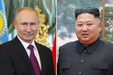 Tổng thống Nga Vladimir Putin (trái) và nhà lãnh đạo Triều Tiên Kim Jong-un. (Ảnh: AFP/TTXVN)