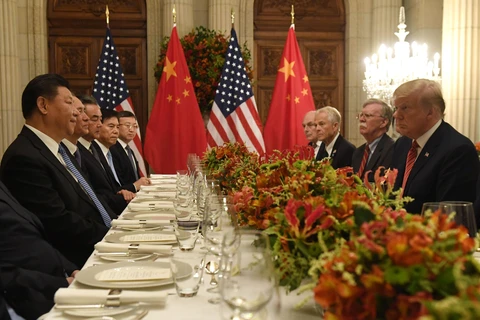 Tổng thống Mỹ Donald Trump trong cuộc gặp Chủ tịch Trung Quốc Tập Cận Bình (thứ 2, trái) bên lề Hội nghị thượng đỉnh G20 ở Buenos Aires, Argentina ngày 1/12/2018. (Ảnh: AFP/TTXVN)