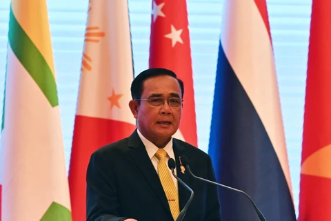 Thủ tướng Thái Lan Prayuth Chan-ocha tại cuộc họp báo về kết quả của Hội nghị Cấp cao Hiệp hội các quốc gia Đông Nam Á (ASEAN) lần thứ 34 ở Bangkok, Thái Lan ngày 23/6. (Ảnh: AFP/TTXVN)
