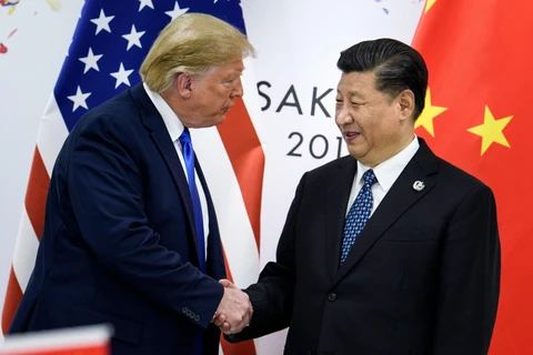 Tổng thống Mỹ Donald Trump và Chủ tịch Trung Quốc Tập Cận Bình. (Ảnh: AFP/ TTXVN)