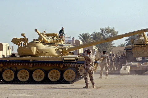 Binh sỹ Iraq tại căn cứ quân sự ở al-Taji, phía bắc thủ đô Baghdad, Iraq. (Ảnh: AFP/TTXVN)