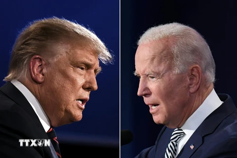 Tổng thống Mỹ Donald Trump (trái) và cựu Phó Tổng thống Mỹ Joe Biden (phải) tại vòng tranh luận trực tiếp đầu tiên ở thành phố Cleveland, bang Ohio ngày 29/9/2020. (Ảnh: AFP/TTXVN)