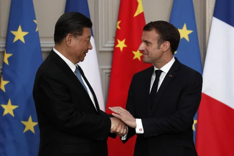 Chủ tịch Trung Quốc Tập Cận Bình và Tổng thống Pháp Emmanuel Macron sau cuộc gặp tại Paris hồi thangs3/2019 (Ảnh: EPA/EFE)