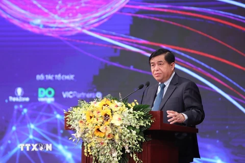 Bộ trưởng Bộ Kế hoạch và Đầu tư Nguyễn Chí Dũng phát biểu tại diễn đàn. (Ảnh: Danh Lam/TTXVN)