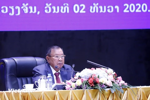 Tổng Bí thư, Chủ tịch nước Lào Bounnhang Vorachith đọc diễn văn tại buổi míttinh. (Ảnh: Phạm Kiên/Vietnam+)