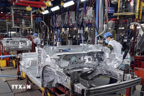 Sản xuất xe ôtô tại nhà máy Ford Hải Dương. Ảnh: Trần Việt - TTXVN