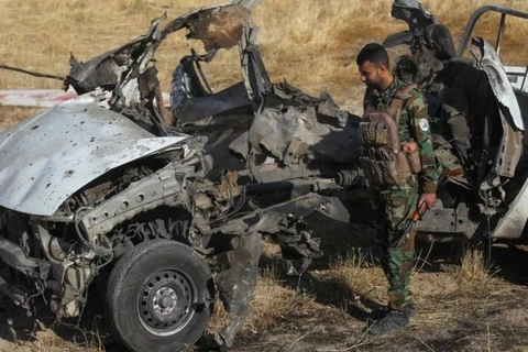 Hiện trường một vụ đánh bom xe tại Iraq. (Nguồn: BBC)