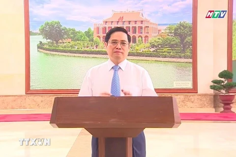 Thủ tướng Chính phủ Phạm Minh Chính phát biểu tại chương trình trực tuyến (ảnh chụp qua màn hình). (Ảnh: Thu Hương/TTXVN)