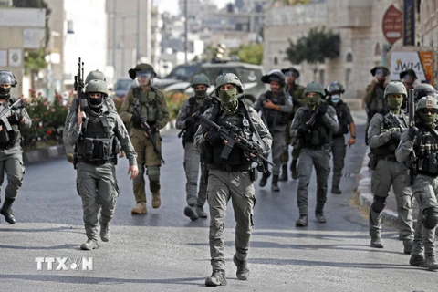 Lực lượng an ninh Israel được triển khai trong cuộc xung đột với người biểu tình Palestine tại thành phố Bethlehem, Khu Bờ Tây ngày 10/9/2021. (Ảnh: AFP/TTXVN)