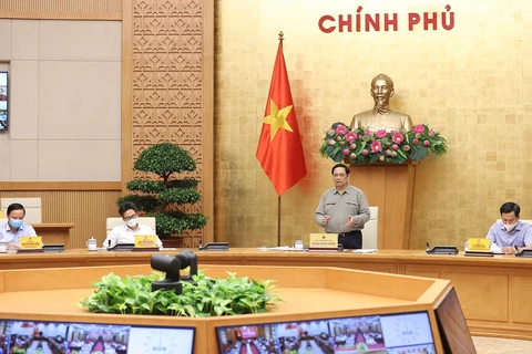 Thủ tướng Phạm Minh Chính chủ trì cuộc họp Ban Chỉ đạo Quốc gia phòng, chống dịch COVID-19. (Ảnh: Dương Giang/TTXVN) 