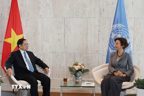 Thủ tướng Phạm Minh Chính gặp Tổng Giám đốc UNESCO Audrey Azoulay. (Ảnh: Dương Giang/TTXVN)