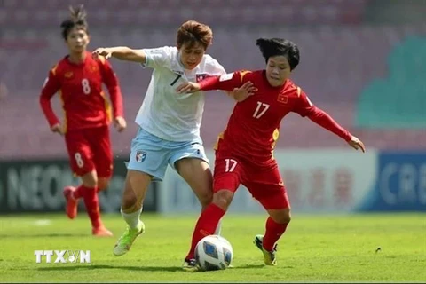 Đội tuyển nữ Việt Nam đã có chiến thắng nghẹt thở 2-1 ở trận play-off với tuyển nữ Đài Bắc Trung Hoa trên sân DY Patil, thành phố Navi Mumbai (Ấn Độ). (Ảnh: TTXVN phát)
