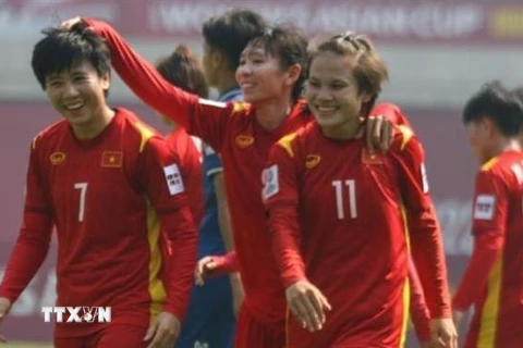 Đội tuyển nữ Việt Nam phải đóng thêm 10% thuế tiền thưởng. (Ảnh: AFC/TTXVN phát)