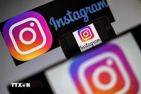 Biểu tượng ứng dụng Instagram trên màn hình điện thoại di động. (Ảnh: AFP/TTXVN)