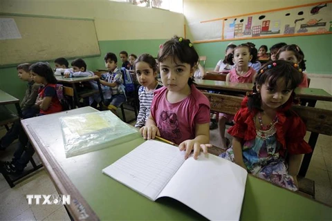 Học sinh tại một trường học ở Tripoli, Libya. (Ảnh: AFP/TTXVN)
