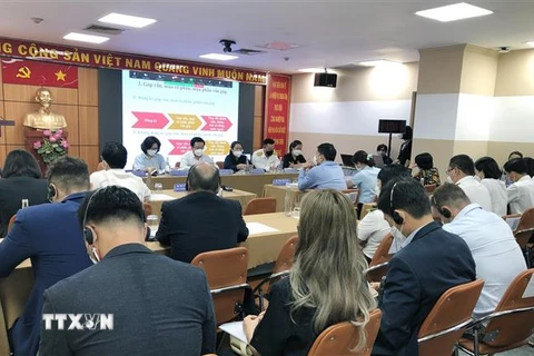 Đại diện Văn phòng đại diện thương nhân nước ngoài tham gia Hội nghị gặp gỡ, đối thoại giữa Văn phòng đại diện thương nhân nước ngoài tại Việt Nam và các cơ quan quản lý nhà nước. (Ảnh: Mỹ Phương/TTXVN)