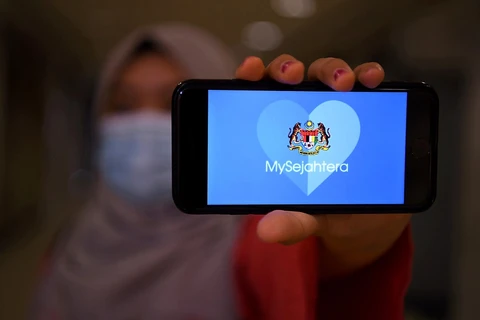 Ứng dụng MySejahtera trên điện thoại tại Kuala Lumpur. (Ảnh: Bernama)
