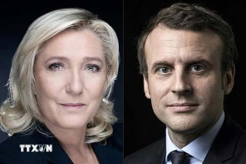 Tổng thống Pháp Emmanuel Macron (phải) và ứng cử viên Marine Le Pen. (Ảnh: AFP/TTXVN)