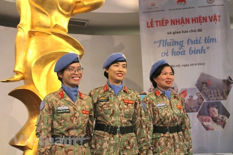 Ba nữ chiến sỹ "mũ nồi xanh" Việt Nam từng làm nhiệm vụ tại châu Phi. (Ảnh: Minh Anh/Vietnam+)