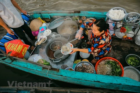 Chợ nổi Cái Răng - địa điểm du lịch thú vị tại Cần Thơ. (Ảnh: Minh Sơn/Vietnam+)