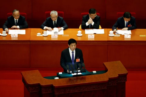 Chủ tịch Quốc hội Trung Quốc Lật Chiến Thư phát biểu tại phiên họp toàn thể lần thứ hai của NPC tại Đại lễ đường Nhân dân ở Bắc Kinh, Trung Quốc ngày 8 tháng 3 năm 2022. (Nguồn: Reuters)
