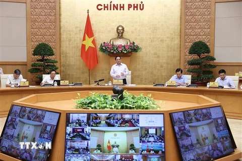 Thủ tướng Phạm Minh Chính chủ trì Hội nghị trực tuyến Chính phủ với địa phương và Phiên họp Chính phủ thường kỳ tháng 9 năm 2022. (Ảnh: Dương Giang/TTXVN)