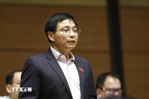 Bộ trưởng Bộ Giao thông Vận tải Nguyễn Văn Thắng trả lời chất vấn. (Ảnh: An Đăng/TTXVN)