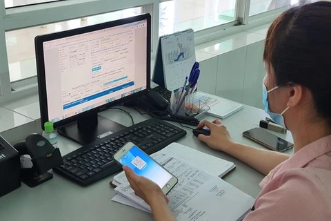 Người dùng có thể sử dụng các kênh cung cấp dịch vụ tra cứu thông tin miễn phí của BHXH. (Ảnh: PV/Vietnam+)