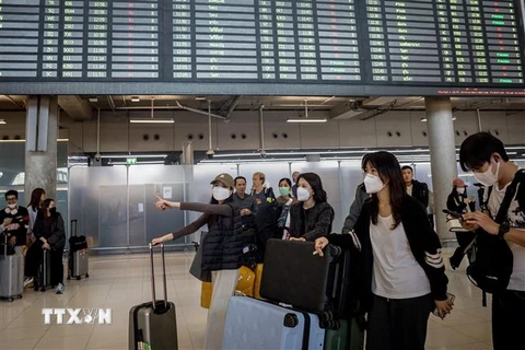 Hành khách tại sân bay Suvarnabhumi ở Bangkok, Thái Lan, ngày 6/1/2023. (Ảnh: AFP/TTXVN)