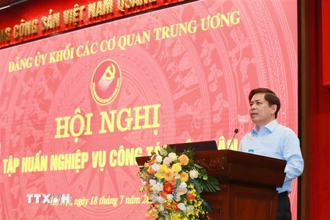 Ông Nguyễn Văn Thể, Ủy viên Trung ương Đảng, Bí thư Đảng ủy Khối các cơ quan Trung ương phát biểu khai mạc hội nghị. (Ảnh: Phương Hoa/TTXVN)