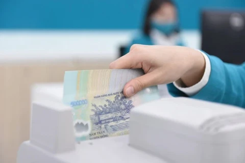 Tính đến cuối tháng 11/2023, tổng dư nợ tín dụng của TP Hồ Chí Minh đạt 3.402.000 tỷ đồng. (Ảnh: Vietnam+)