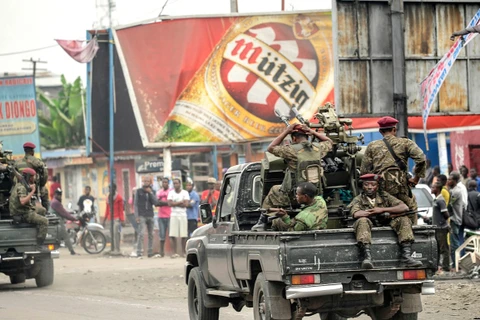 Binh sỹ CHDC Congo tuần tra trên đường phố tại Kinshasa. (Ảnh: AFP/TTXVN)