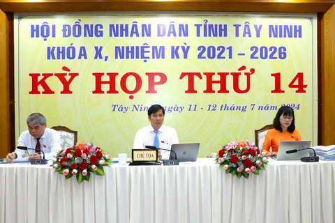 Lãnh đạo HĐND tỉnh Tây Ninh chủ trì kỳ họp. (Ảnh: Minh Phú/TTXVN)