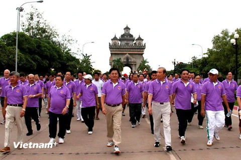 Bô Ngoại giao Lào tổ chức đi bộ kỷ niệm 17 năm gia nhập ASEAN