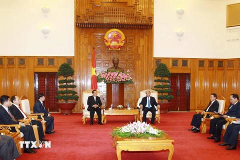 Phó Thủ tướng tiếp Đoàn đại biểu cấp cao Thông tấn xã Pathết Lào